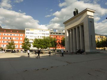 Gate with young playing skate