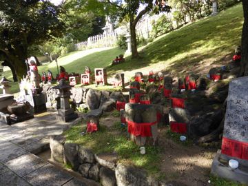 Red tissues on graves
