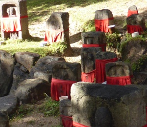 Red tissues on graves